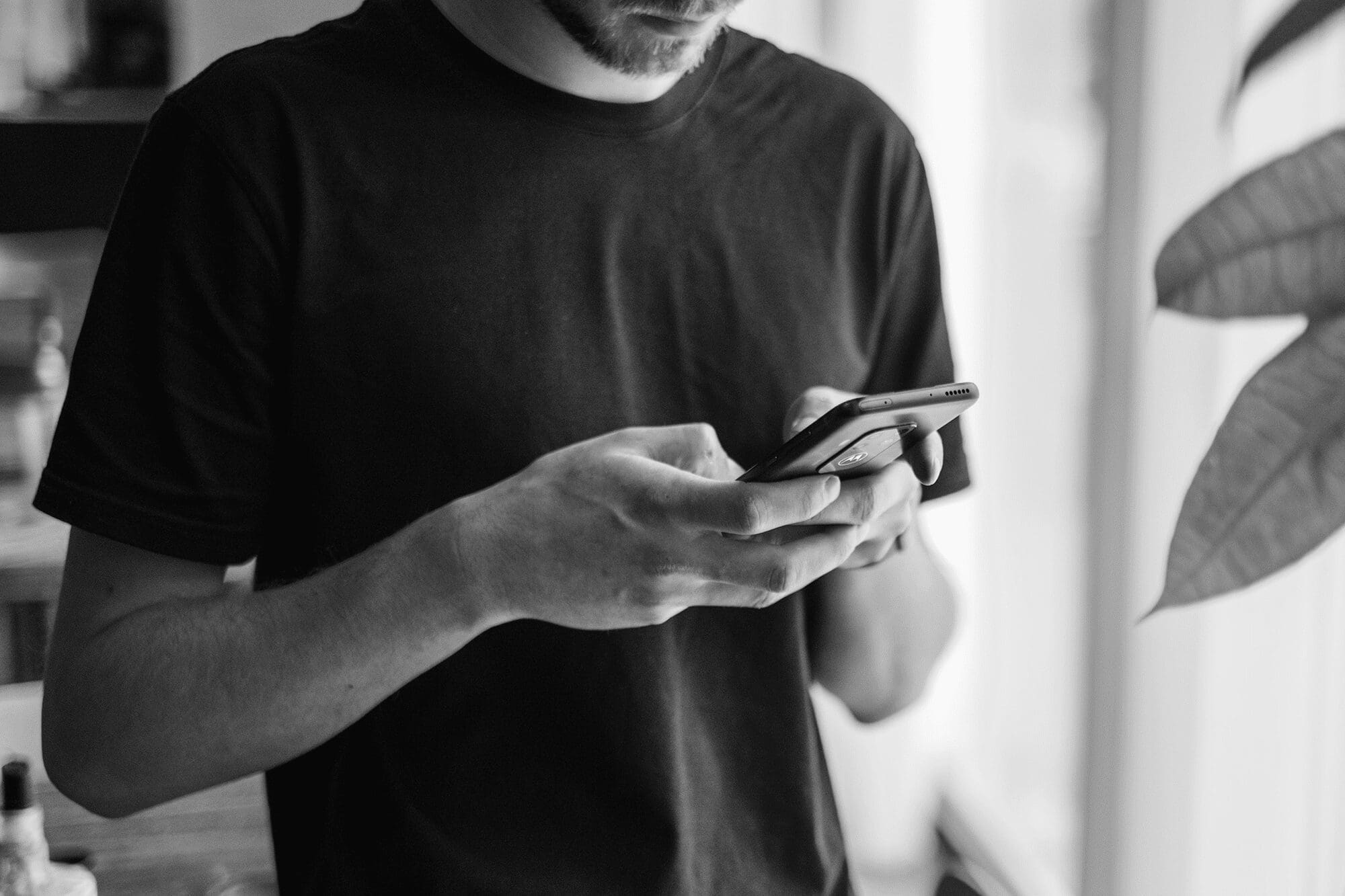 Person texting on cell on cell phone